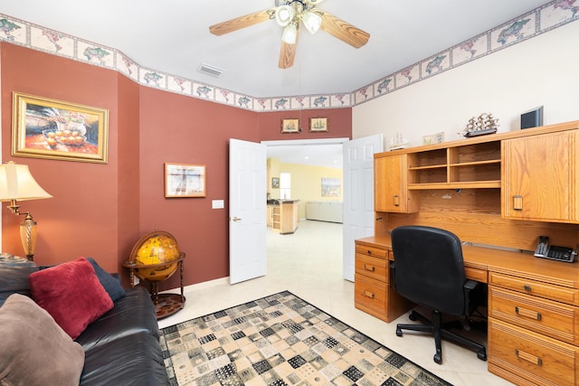 office area with ceiling fan and light tile patterned floors