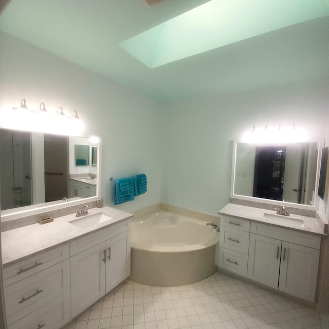 bathroom with a bathtub and vanity