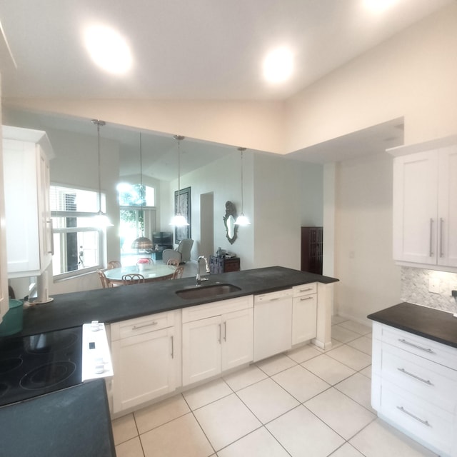 kitchen with decorative light fixtures, white cabinets, sink, and white dishwasher