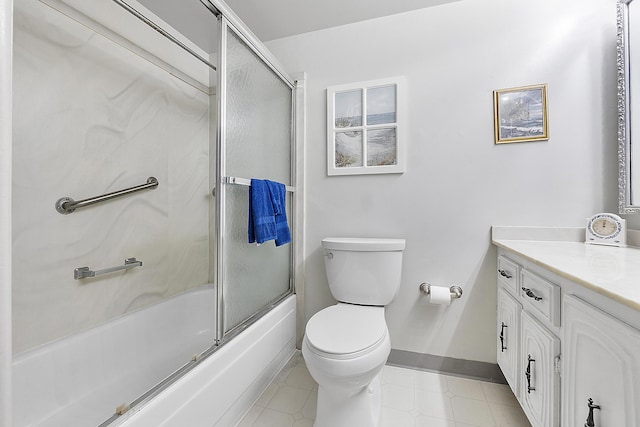 full bathroom with combined bath / shower with glass door, vanity, and toilet