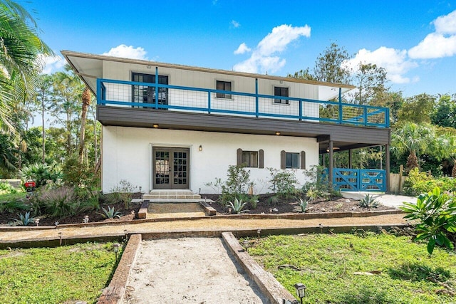 back of house with french doors