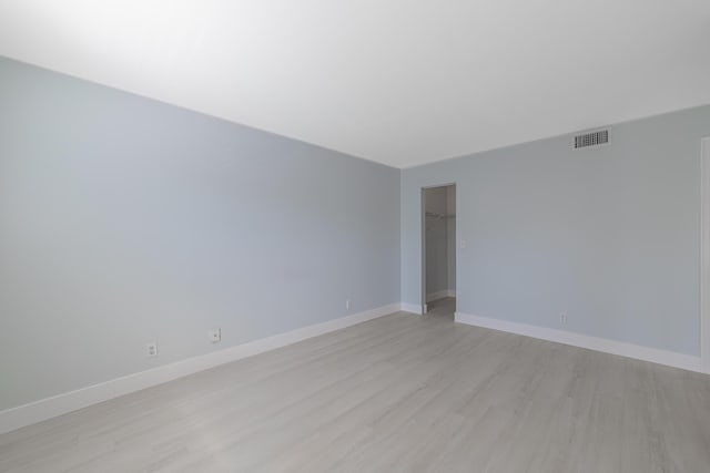 empty room with light wood-type flooring