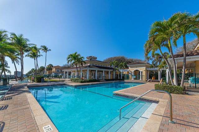 view of swimming pool with a patio area