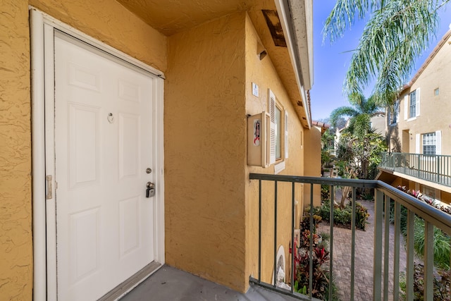 doorway to property with a balcony