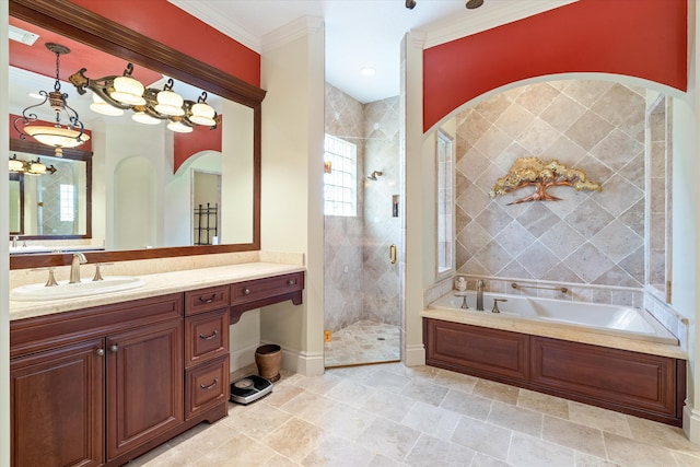 bathroom with ornamental molding, separate shower and tub, and vanity