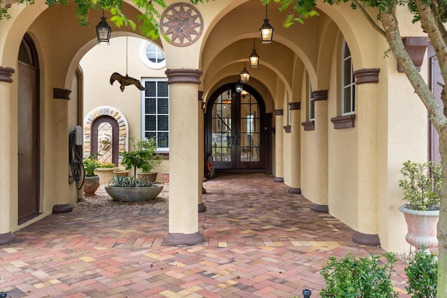 entrance to property featuring french doors