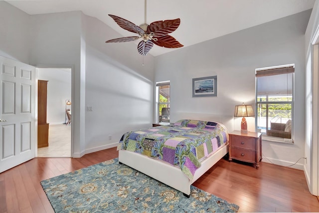 bedroom featuring hardwood / wood-style flooring and ceiling fan