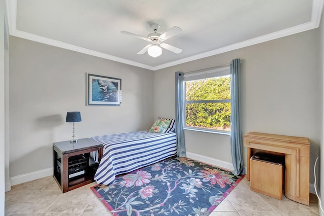 tiled bedroom with ceiling fan and ornamental molding