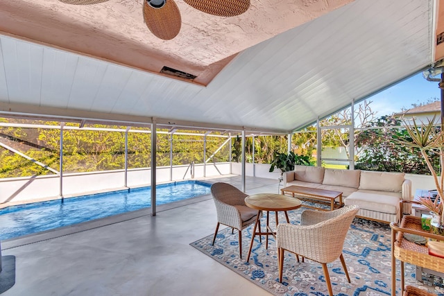 view of pool with ceiling fan