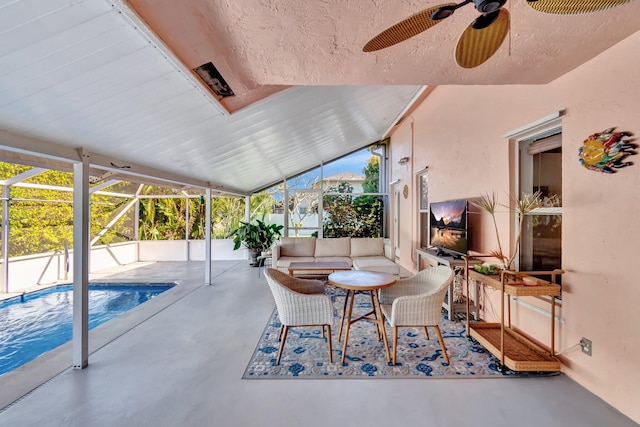 view of patio / terrace featuring an outdoor hangout area, ceiling fan, and a lanai