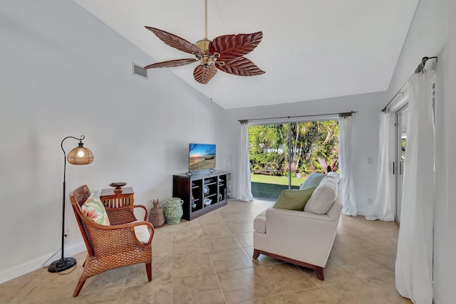 living room with ceiling fan and lofted ceiling