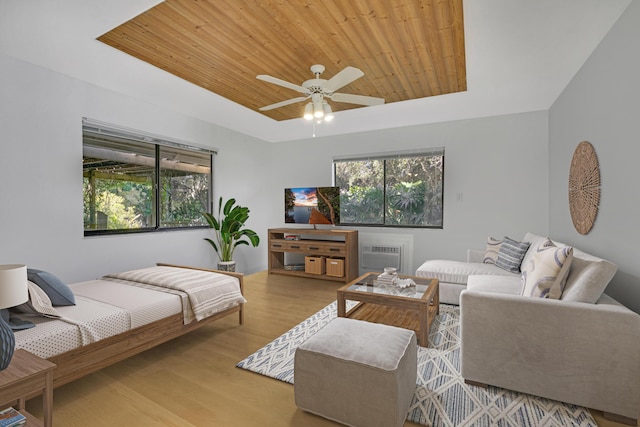 living room featuring wooden ceiling, light hardwood / wood-style floors, and ceiling fan