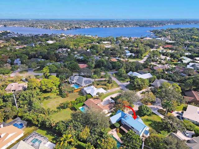 bird's eye view with a water view