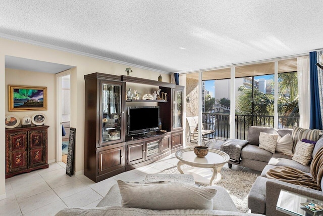 living room featuring expansive windows, light tile patterned flooring, ornamental molding, and a textured ceiling