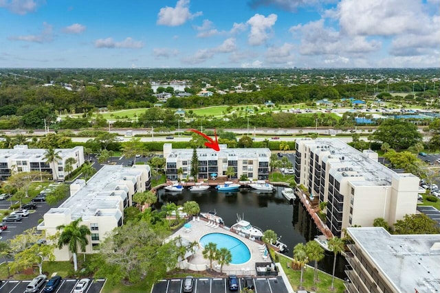 birds eye view of property featuring a water view