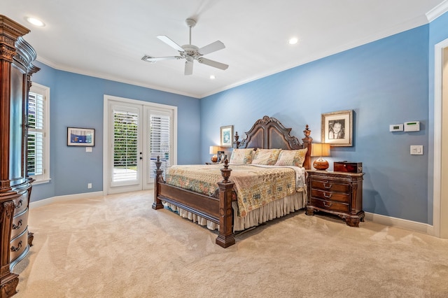 carpeted bedroom with ceiling fan, access to exterior, ornamental molding, and french doors