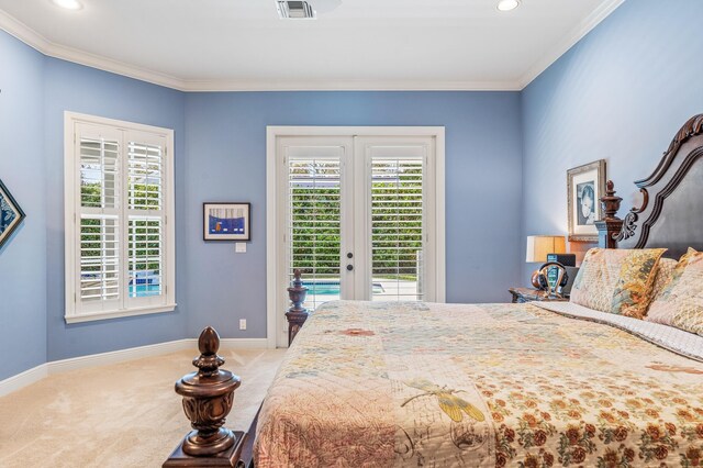 carpeted bedroom with french doors, access to outside, and ornamental molding