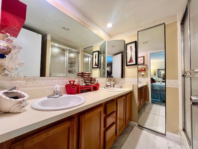 bathroom with tile patterned floors, vanity, and walk in shower