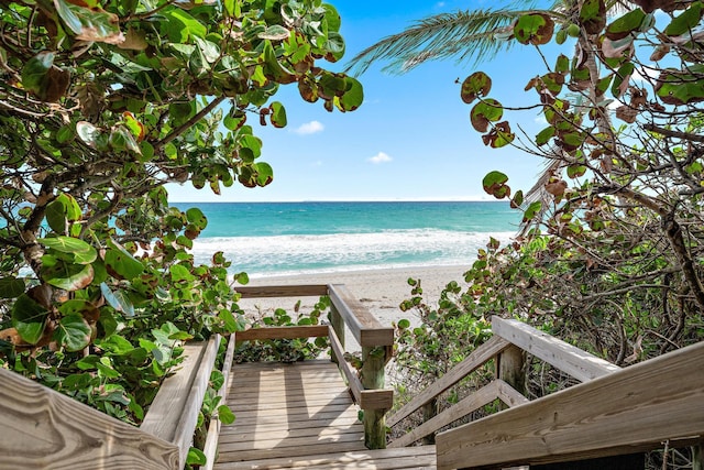 view of water feature with a beach view