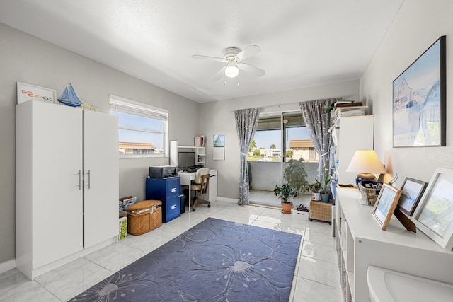 interior space featuring ceiling fan