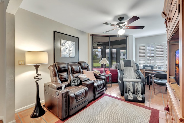 tiled living room featuring ceiling fan