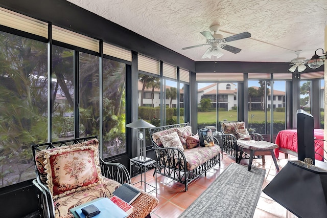 sunroom with ceiling fan