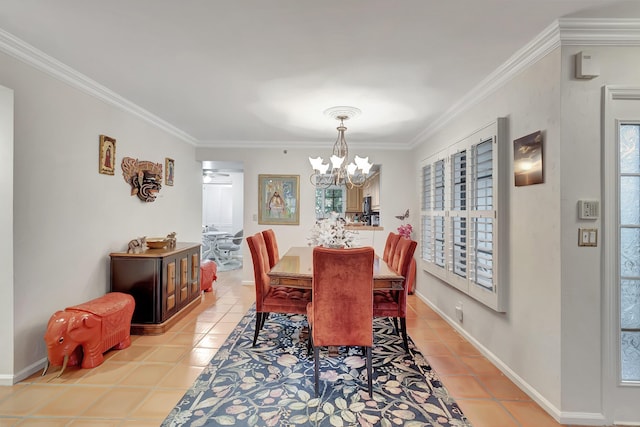 tiled dining space featuring ceiling fan with notable chandelier and crown molding