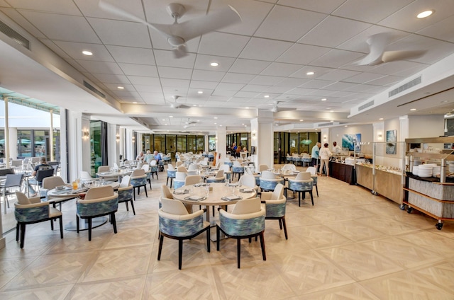 dining area featuring light parquet flooring and ceiling fan