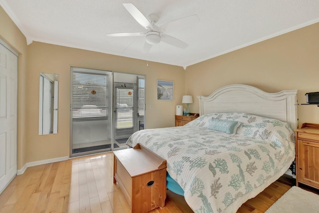 bedroom featuring light wood-type flooring and ceiling fan