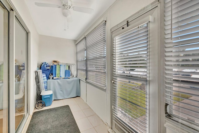 interior space with ceiling fan and plenty of natural light