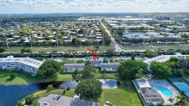 drone / aerial view featuring a water view