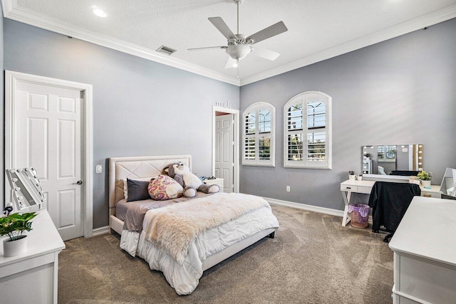 bedroom featuring dark colored carpet, ceiling fan, crown molding, and a textured ceiling