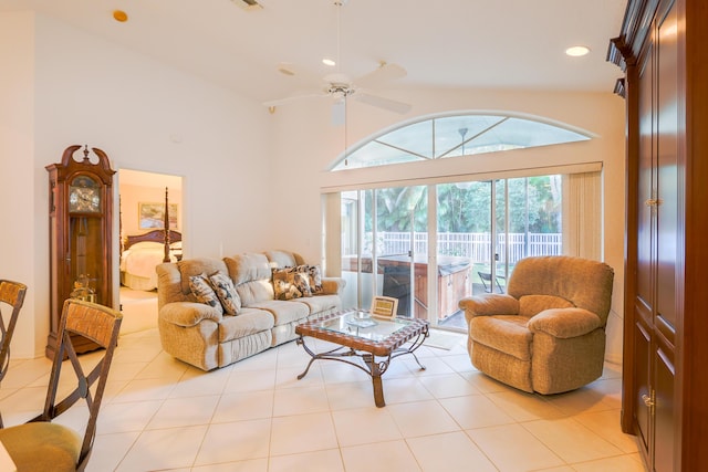 living room featuring light tile patterned floors and ceiling fan