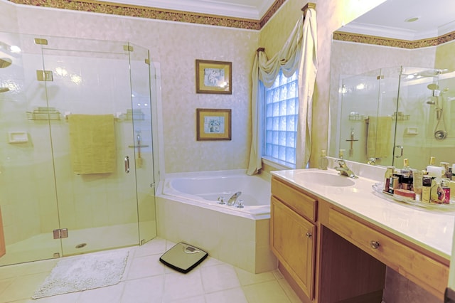 bathroom featuring tile patterned floors, vanity, shower with separate bathtub, and ornamental molding