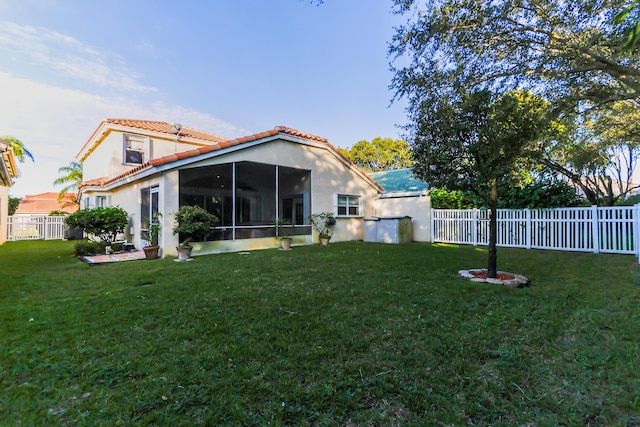 view of yard featuring a sunroom