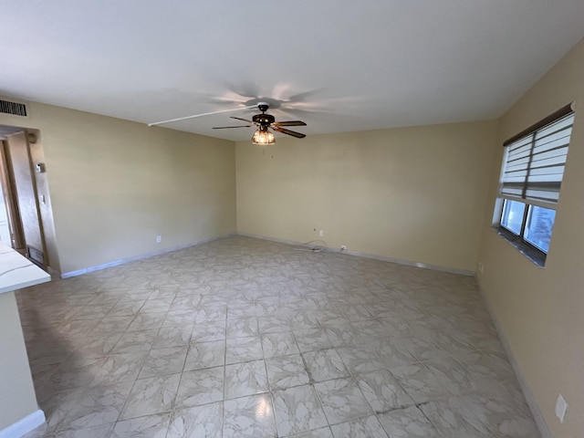 unfurnished room featuring ceiling fan