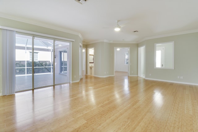 unfurnished room featuring light hardwood / wood-style floors, ceiling fan, and ornamental molding