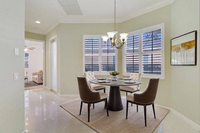 dining space with light tile patterned floors, ceiling fan with notable chandelier, and ornamental molding