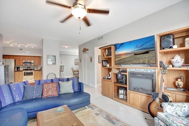 living room with ceiling fan