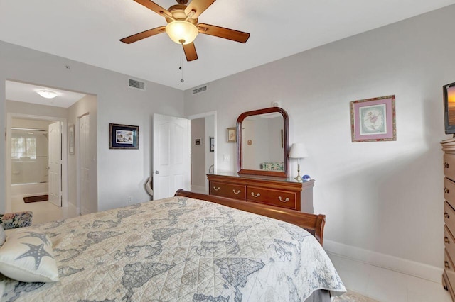 bedroom with ensuite bath and ceiling fan