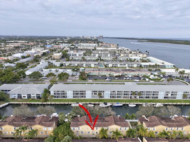 birds eye view of property featuring a water view