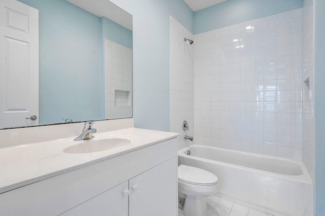 full bathroom featuring tile patterned floors, vanity,  shower combination, and toilet