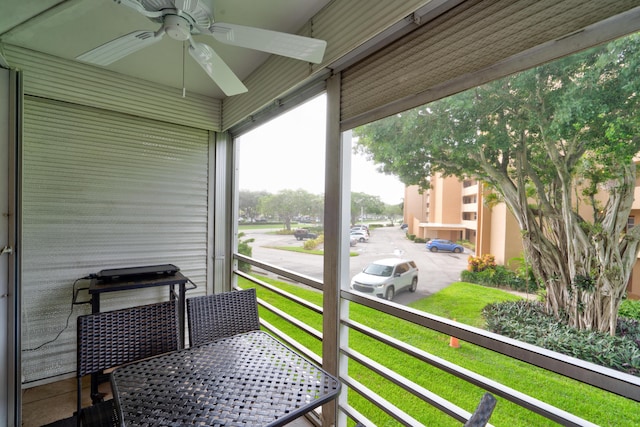 balcony featuring ceiling fan