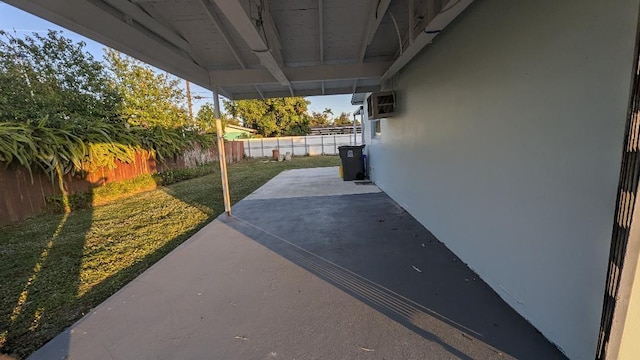 view of patio featuring a wall mounted air conditioner