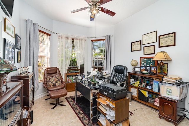 office area featuring ceiling fan and light tile patterned floors