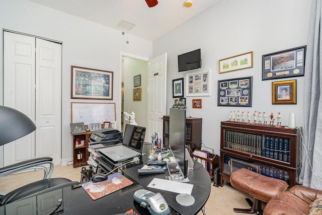 home office featuring ceiling fan and light tile patterned flooring