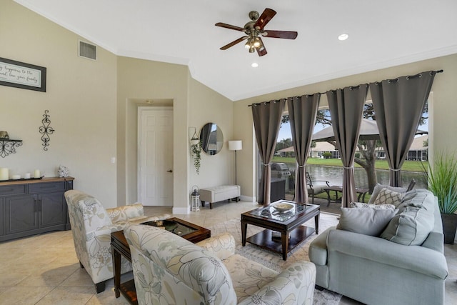 tiled living room featuring ceiling fan and ornamental molding