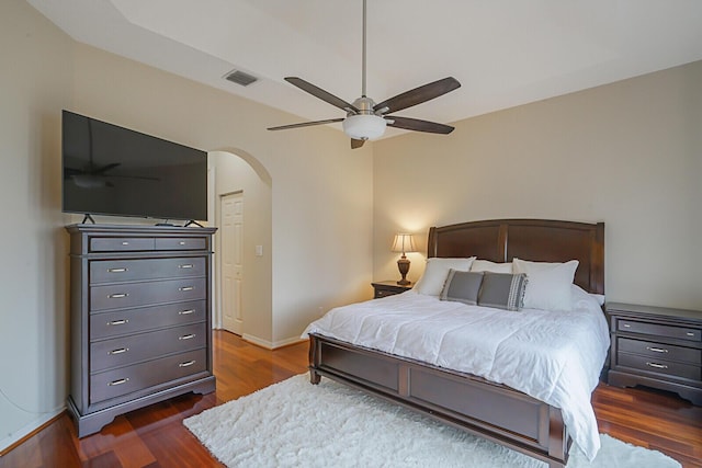 bedroom featuring ceiling fan and dark hardwood / wood-style flooring