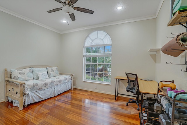 office area with ceiling fan, ornamental molding, and hardwood / wood-style flooring