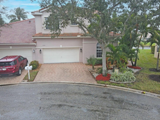 view of front of home with a garage